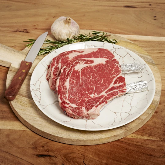 Rib Eye On The Bone Steak Free Range Grass Fed