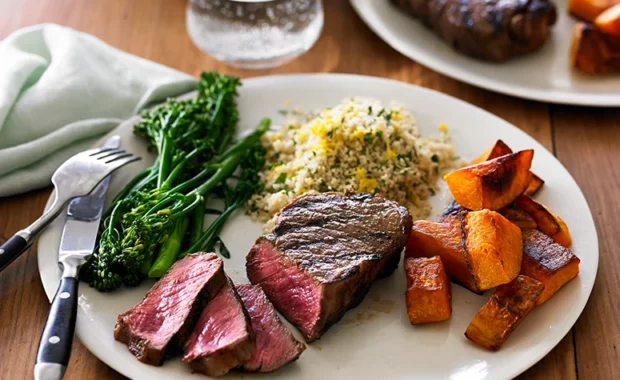 charred beef sirloin pumpkin broccolini and herb couscous